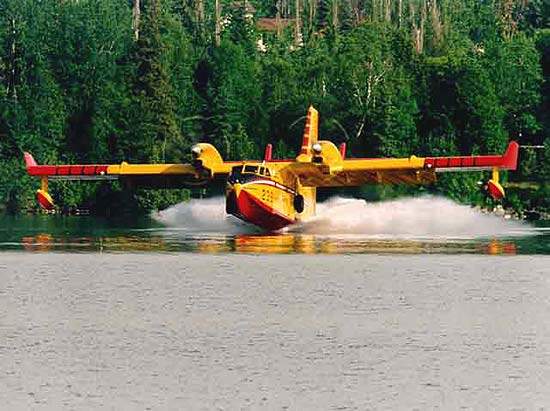 The water tanks are filled in flight while skimming over the water surface via two hydraulically operated scoops.