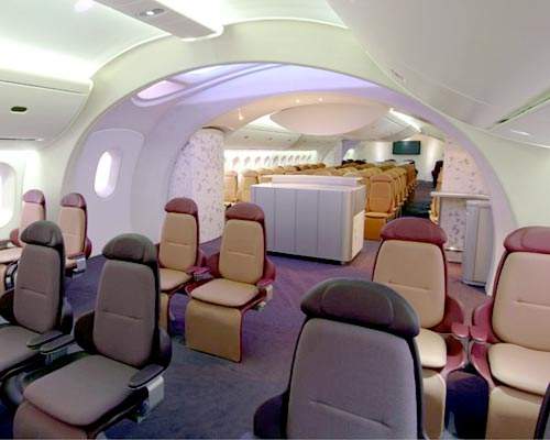 Boeing has explored radical new concepts for the interior cabin configuration including 'sweeping arches' and 'a calming, simulated sky' to enhance passenger perception of spaciousness.